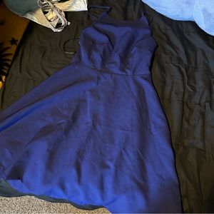 Lulus size small navy blue dress. Halter like top and open tie back.